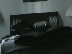 A horny couple making passionate love in the bedroom with a non-professional sex tape